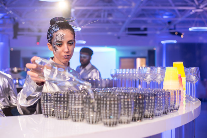 Bartender pouring drinks at Illuminate